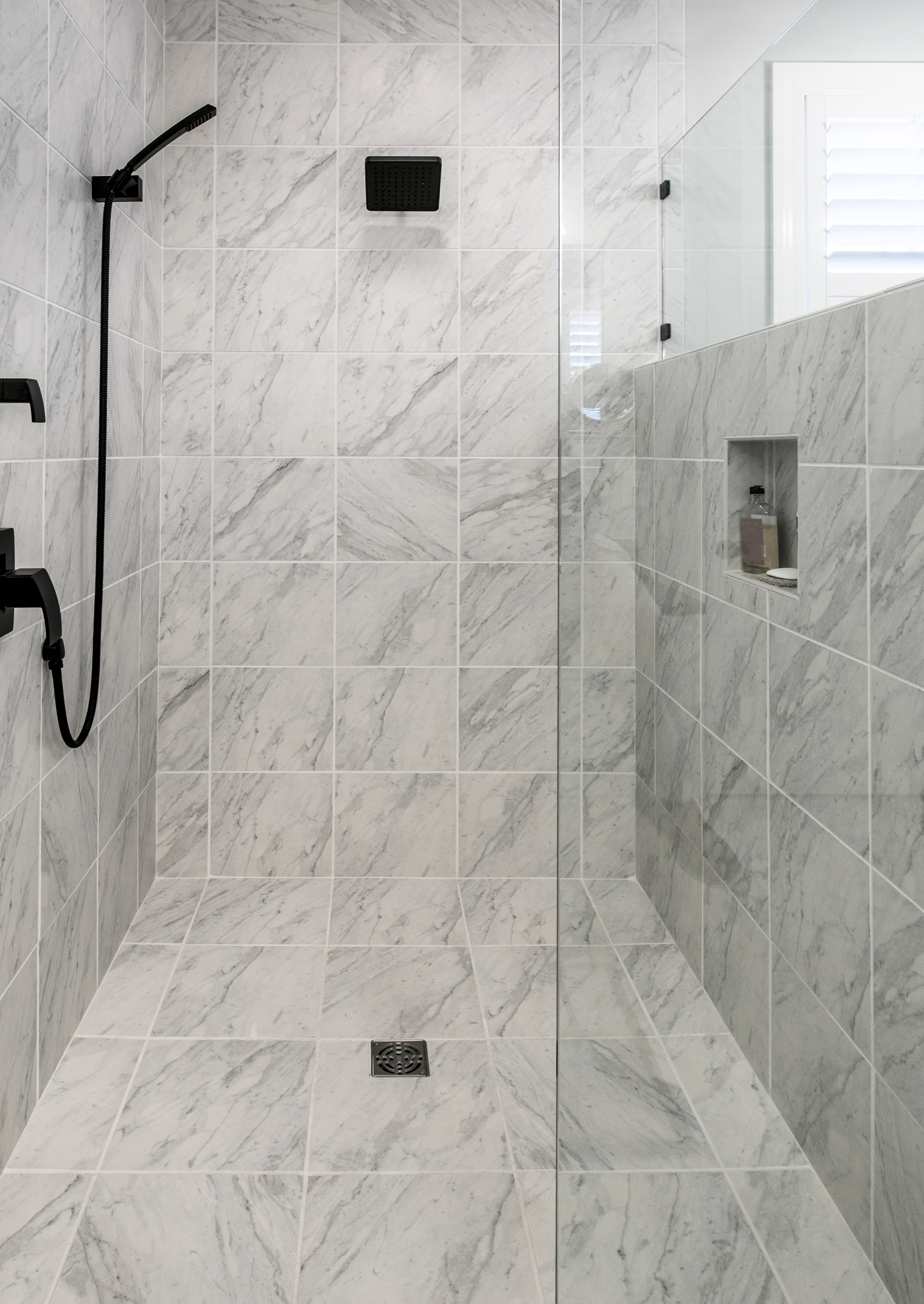 An image of a new bathroom without shower screens